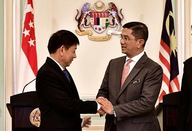 Khaw Boon Wan and Azmin Ali Handshake