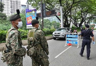 马来西亚出动军队和警察防疫