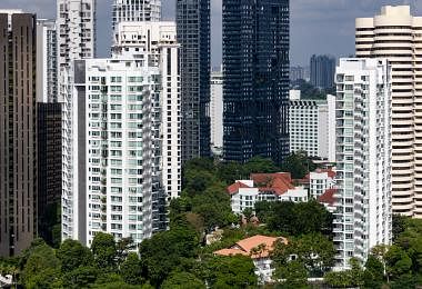 城市化让新加坡越来越富有，但四处钢筋水泥也让这里越来越炎热