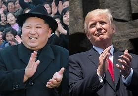 Kim and Trump clapping