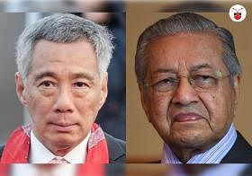 新加坡总理李显龙（左）和马国首相马哈迪。