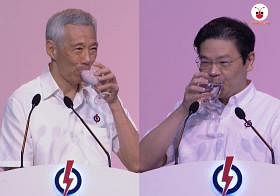 李显龙总理（左）和黄循财副总理在演说时都用“魔法杯”喝水